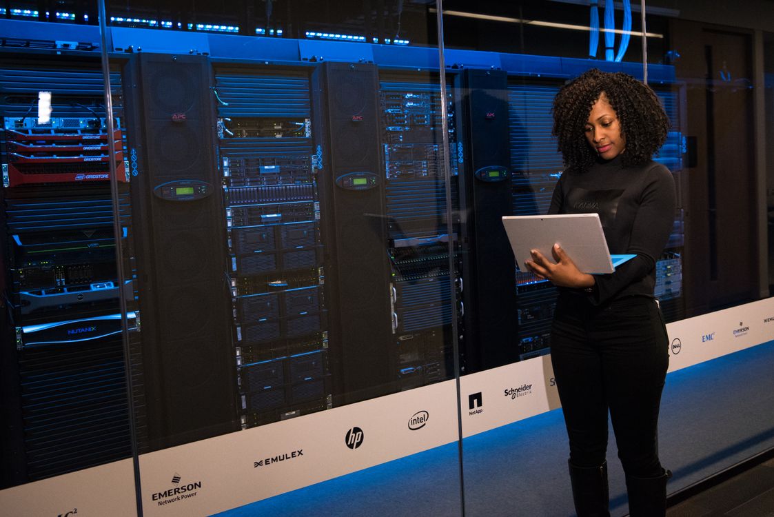 IT engineer monitoring data servers, representing upskilling into infrastructure and cloud roles